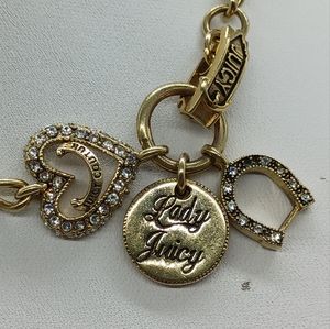 JUICY COUTURE GOLD CLEAR STONE LADY JUICY, HEART, AND HORSESHOE CHARM CH…